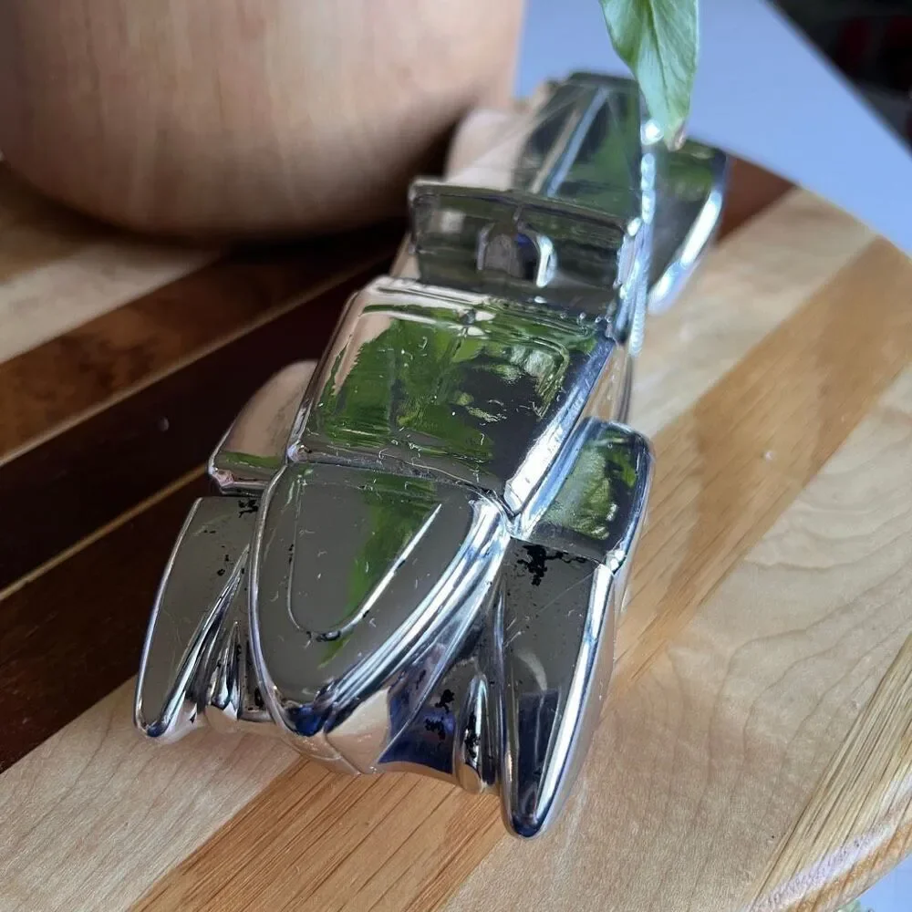 Avon Silver Duesenberg Car Decanter, which was originally marketed for Wild Coun